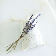 Load image into Gallery viewer, A simple lavender muslin sachet bag by Lavande photographed with sprigs of dried lavender
