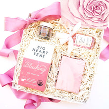 Load image into Gallery viewer, A gift box featuring the color pink by The Gift Veil. Gift box includes pink hibiscus tea, rose facial soap, rose face mist, floral facial steam and a pink rose notecard perfect for a bridesmaid gift or bride to be gift.
